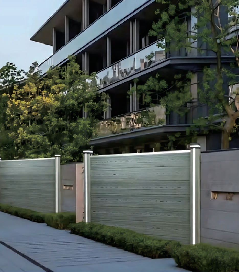 Light composite privacy fencing at a contemporary building